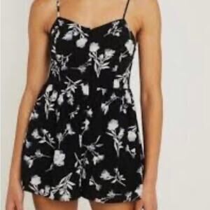 URban outfitters floral button romper with pockets stretching/smocked back SZ S